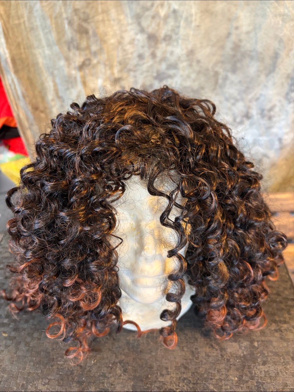 Curly Synthetic Wig in Dark Brown with Auburn Highlights